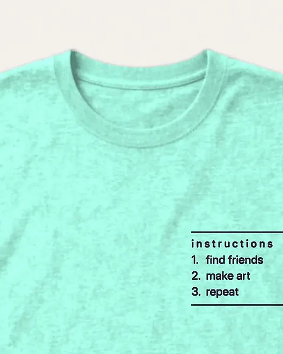Close-up of the Make Art With Friends Tee collar and garment-dyed cotton