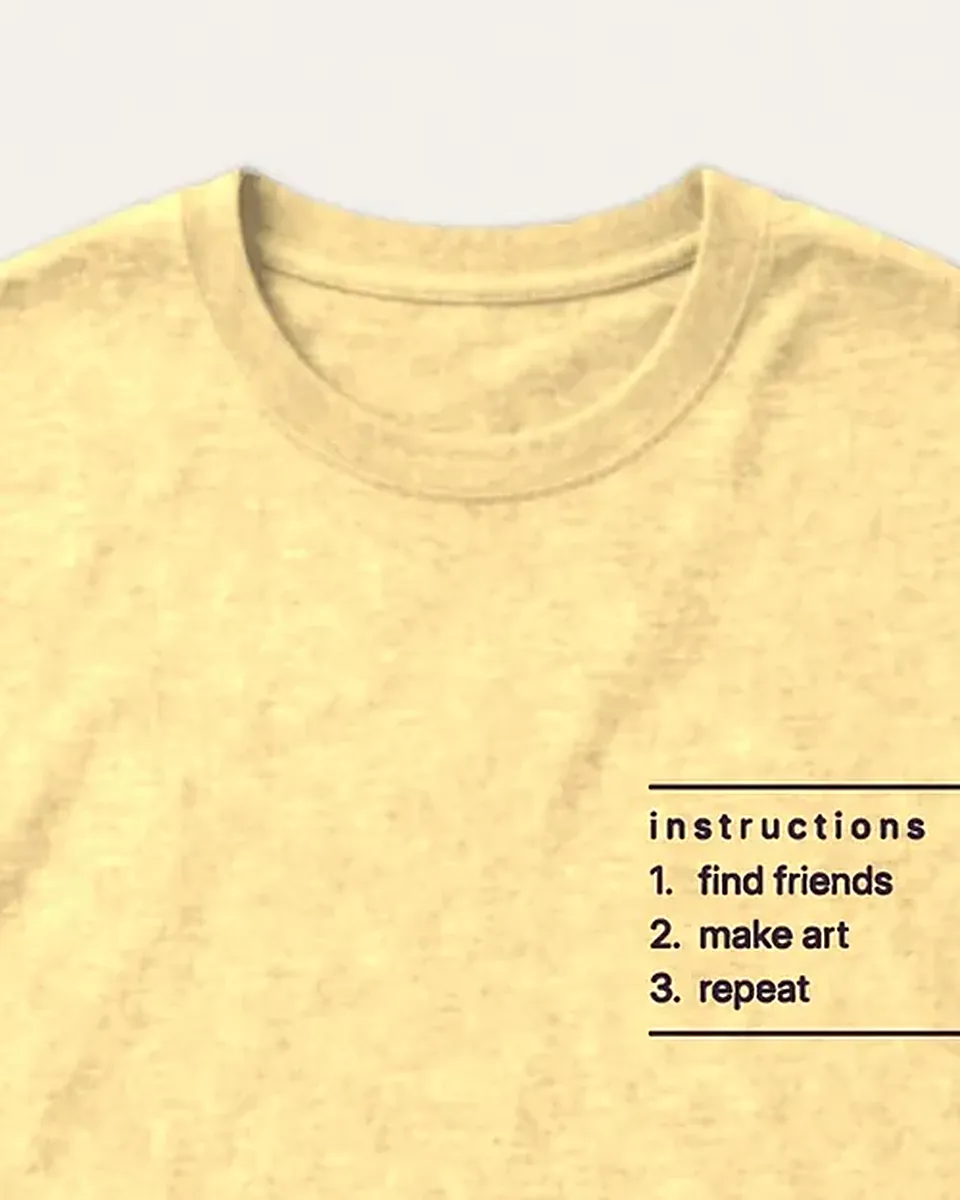 Close-up of the Make Art With Friends Women's Boxy Tee: the collar and garment-dyed cotton